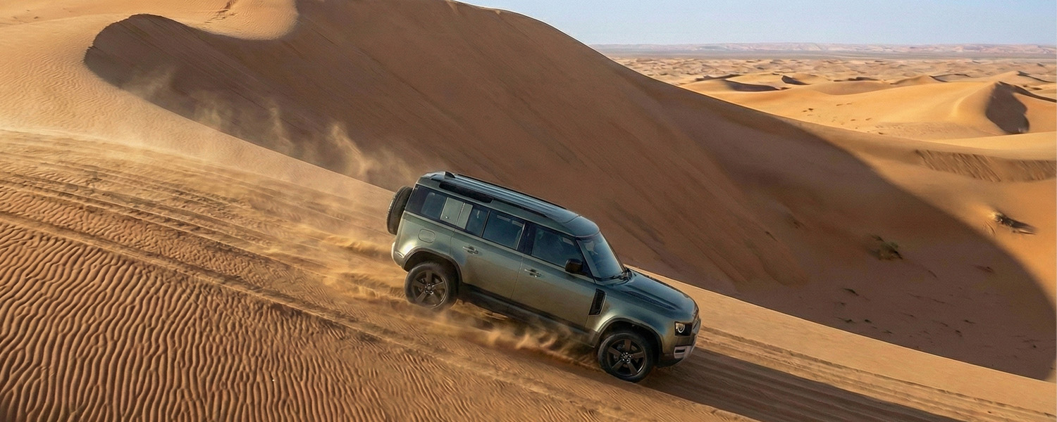 Land Rover conquering sand dunes